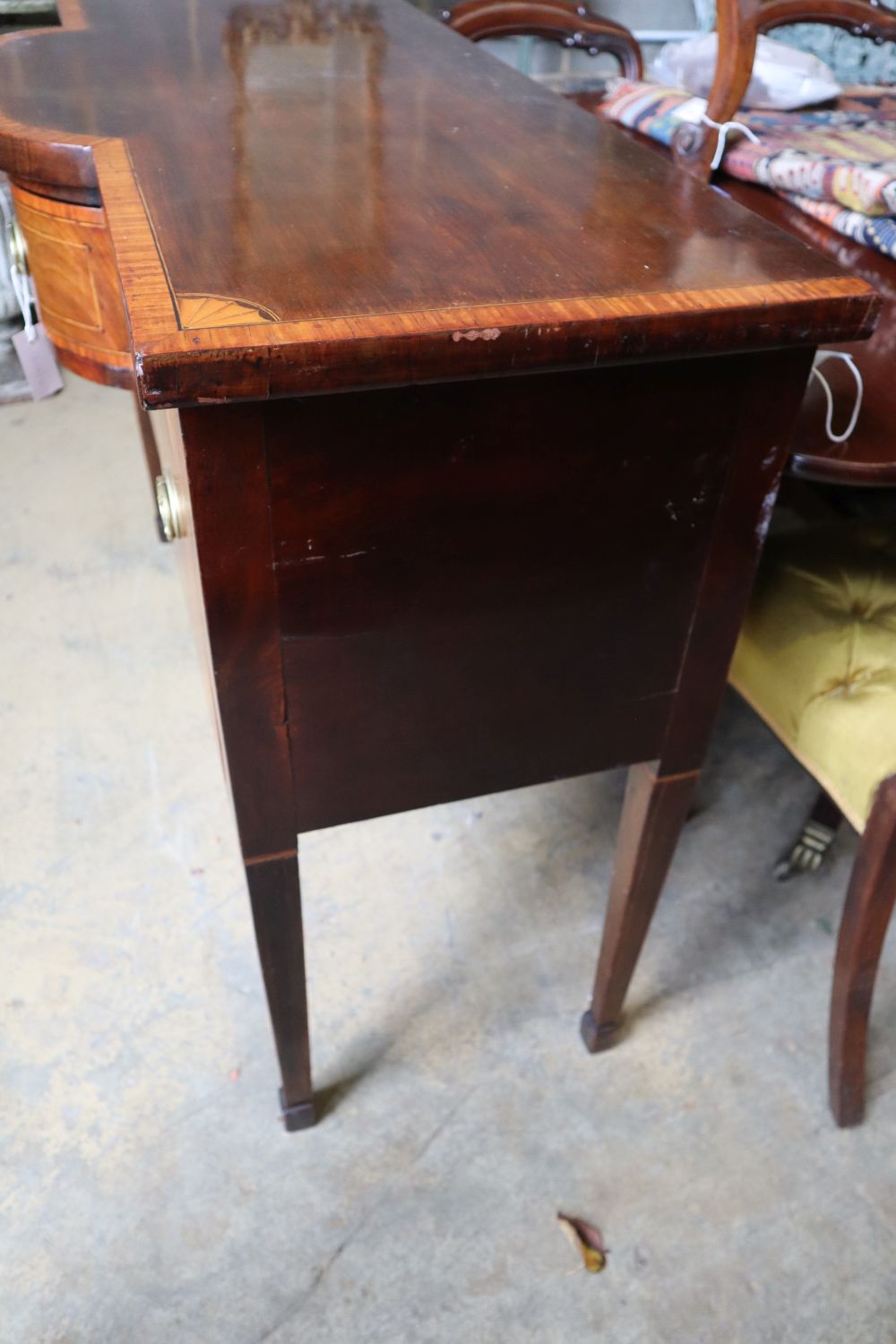 A George III satinwood banded and inlaid mahogany bowfront sideboard, width 129cm depth 53cm height 91cm